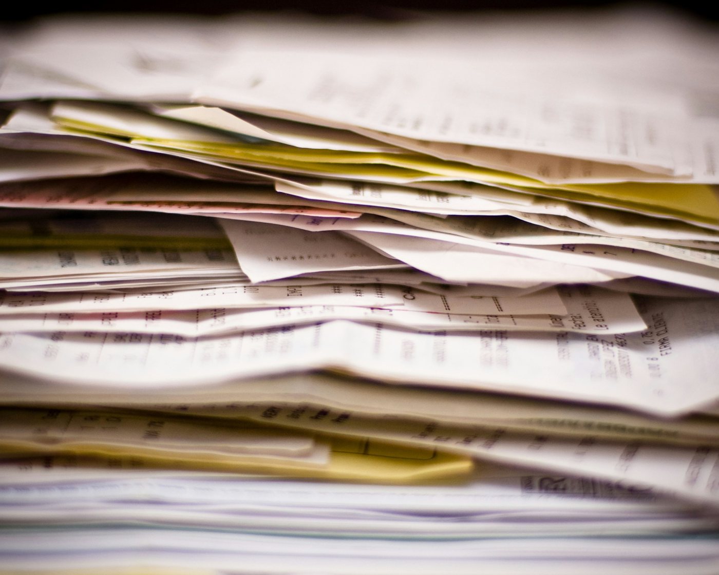 A stack of collection records and documents